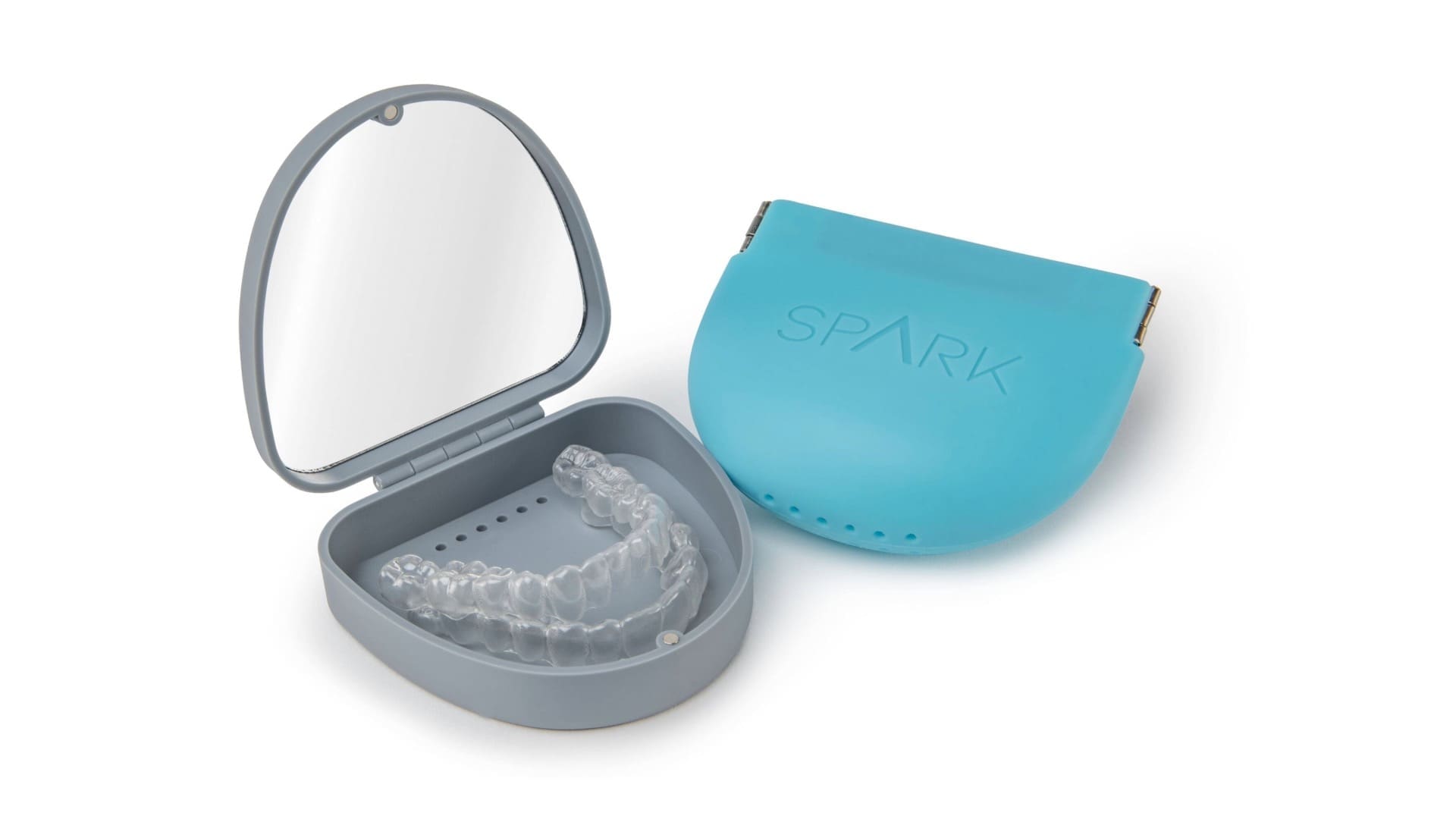 Aparat ortodontic transparent Spark într-o cutie cu oglindă